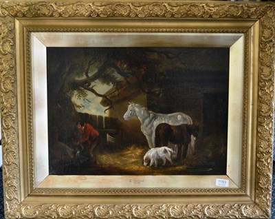 Lot 1183 - After George Morland, Horses in a stable with a farm boy pouring water, oil on canvas, 38cm by...