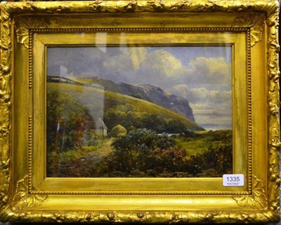 Lot 1335 - Circle of George Blackie Sticks (1843-1938) Coastal landscape with cottages, oil on board,...