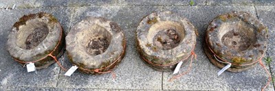 Lot 1406 - Four circular stone troughs, 33cm diameter