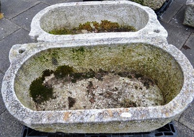 Lot 1428 - Two oval shaped stone troughs, 110cm and 120cm wide