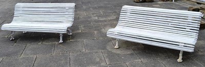 Lot 1440 - A pair of Victorian style cast iron and slatted garden benches, late 20th century, each of...