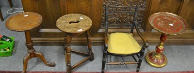 Lot 1448 - A 20th century carved mahogany tripod table, a 20th century oak circular stool on turned legs,...