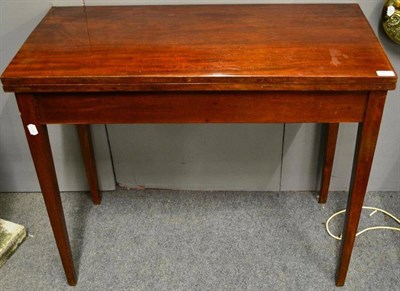 Lot 1453 - George III mahogany fold over tea table