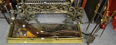 Lot 1488 - Victorian brass fire curb, two steel fenders, two sets of fire irons with stands