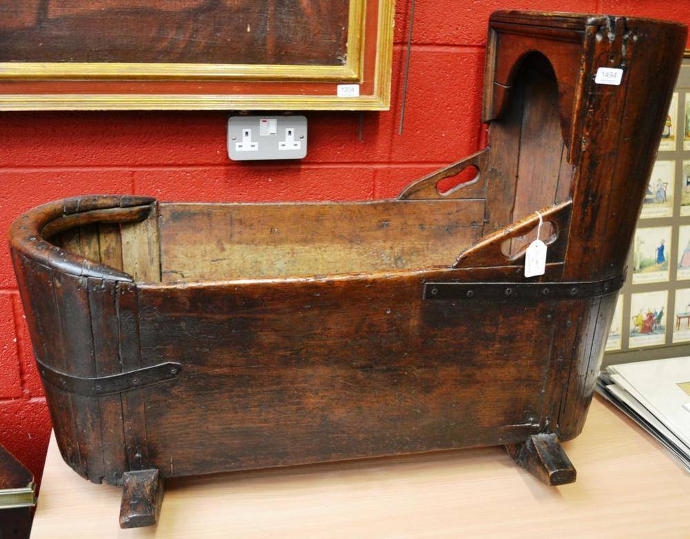 Lot 1494 - An early 19th century cradle of staved construction