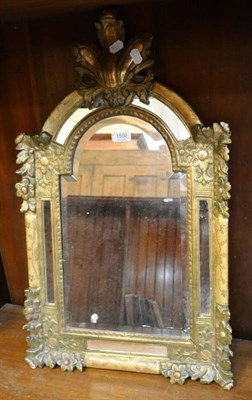 Lot 1500 - An 18th century gilt gesso marginal mirror, George II style mahogany and parcel gilt pier glass and