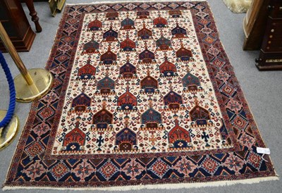 Lot 1512 - Afshar rug, South East Persia, the ivory field with columns of heraldic devices enclosed by...