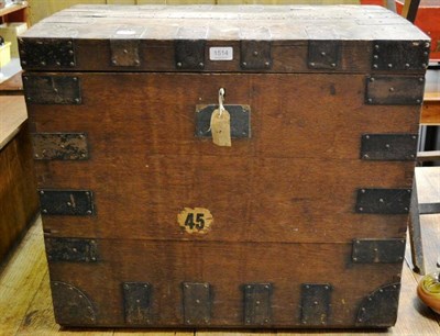 Lot 1514 - ^ A 19th century oak and metal bound silver chest with key