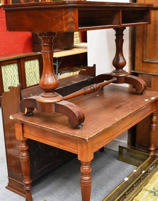 Lot 1518 - ^ Victorian mahogany library table lacking drawers, a late Victorian walnut writing table and a...