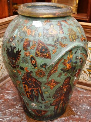 Lot 1524 - A 19th century Continental terracotta ovoid storage jar, with applied lithograph scraps on a...