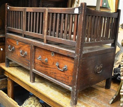 Lot 1549 - An 18th century provincial elm cot with slatted sides and two deep drawers, 120cm wide