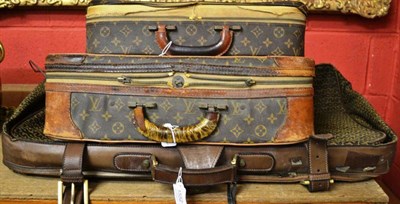 Lot 1552 - Two Louis Vuitton small cases with zip fastenings and another larger case with fabric mount (3)