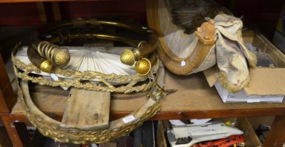 Lot 1559 - Two gilt metal canopies, a pair of brass horseshoe shaped curtain poles with brackets and a...