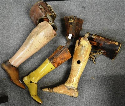 Lot 1561 - Three late Victorian prosthetic legs