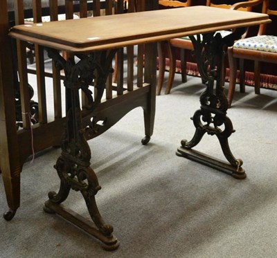 Lot 1568 - Victorian cast iron table with mahogany top, 105cm wide