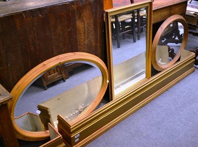 Lot 1580 - Pair of oval wall mirrors, a modern gilt mirror and three framed portrits