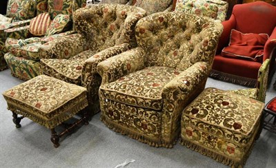 Lot 1594 - Pair of button back tub shaped armchairs and matching footstool upholstered in green and brown...