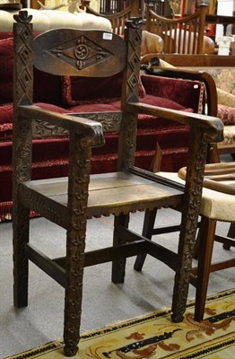 Lot 1599 - A 19th century carved oak chair, possibly Irish