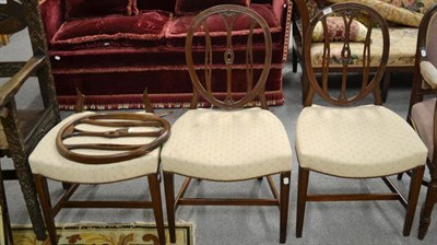 Lot 1600 - # Three Hepplewhite style mahogany dining chairs, hoop backs with beaded outline and pierced...