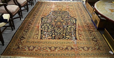 Lot 1610 - Tabriz prayer carpet, Persian Azerbaijan, the mid indigo field of scrolling vines beneath the...