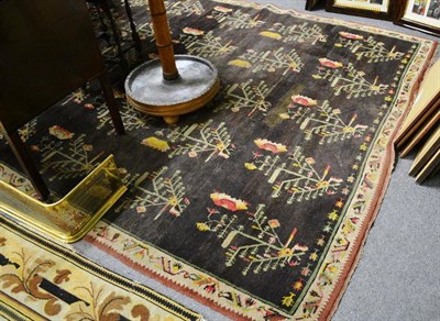 Lot 1612 - Thrace carpet, European Turkey, the field with five columns of stylised plants enclosed by...