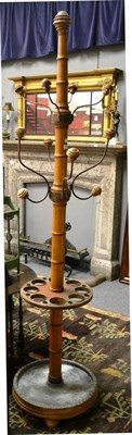 Lot 1621 - Victorian bamboo simulated coat stand with eight suspension arms, turned support and brass...