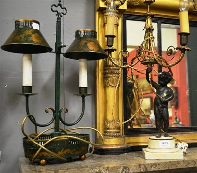 Lot 1623 - A 19th century gilt and bronze two branch candelabra (a.f.) and a green toleware two branch...