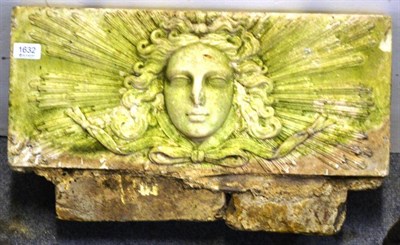 Lot 1632 - Early 18th century marble chimney piece panel carved with Apollo head, 53cm wide