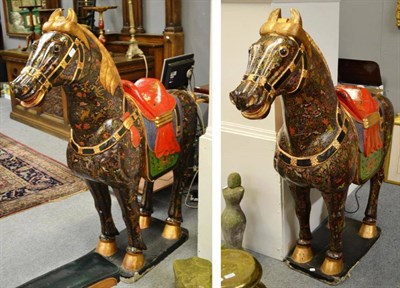 Lot 1635 - A massive pair of Chinese Tang style polychrome decorated figures of horses, 20th century,...