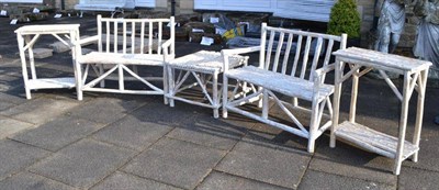 Lot 1650 - A five piece rustic branch constructed garden suite comprising two benches, two side tables and...