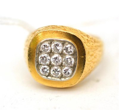 Lot 39 - A diamond set ring, nine round brilliant cut diamonds in a grid formation, to textured...