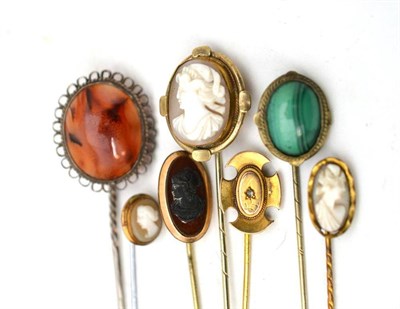 Lot 45 - Seven assorted stick pins, including a hardstone cameo, three shell cameos, a diamond set, a...