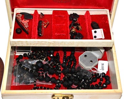 Lot 64 - A jewellery box containing assorted jet brooches, earrings etc and French jet items (qty)