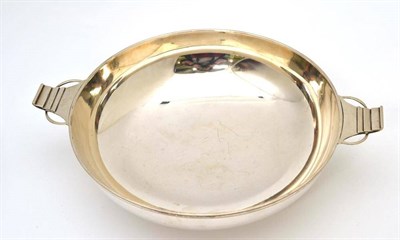 Lot 71 - A silver twin handled bowl, Birmingham 1934, 29.5cm wide over handles