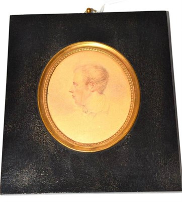 Lot 82 - John Timmeau, portrait miniature of a young gentleman, circa 1820, turning sharply to dexter,...