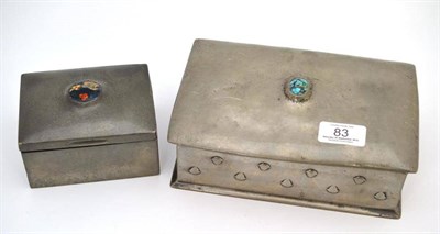 Lot 83 - A Tudric pewter cigarette box, the cover set with an enamel plaque, 11.5cm wide and an Arts &...