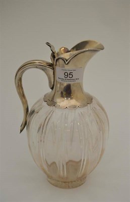 Lot 95 - An Edwardian silver mounted claret jug, John Grinsell & Sons, London 1903, the ovoid body with...