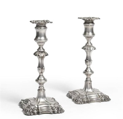 Lot 105 - A pair of Victorian silver candlesticks, 24cm high