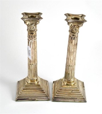 Lot 109 - A pair of modern silver Corinthian column candlesticks, Birmingham 1970, 25cm high