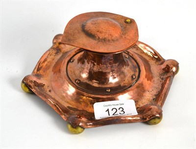 Lot 123 - An Arts & Crafts copper inkwell, stamped 1905 and monogrammed, 16cm wide