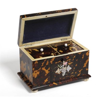 Lot 136 - A late Georgian tortoiseshell tea caddy, 18cm wide