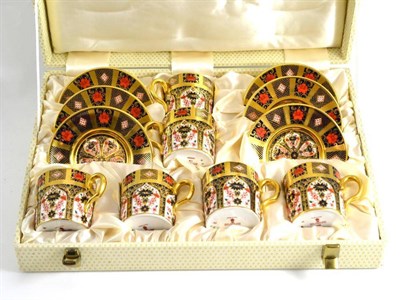 Lot 144 - A cased set of six Royal Crown Derby coffee cups and saucers