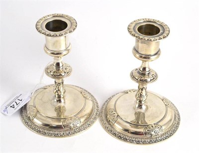 Lot 174 - Pair of silver dwarf candlesticks by Robert Garrard, London 1877, 12cm high