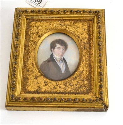 Lot 186 - Mulnier (Continental), circa 1840, portrait miniature of a young gentleman, with brown curly...