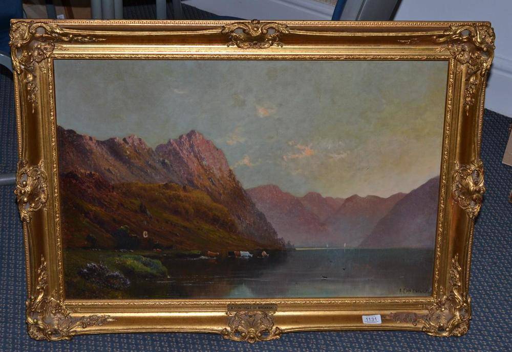 Lot 1131 - Alfred Fontville de Breanski (1877-1955) Cattle watering before a Highland landscape at sunset,...