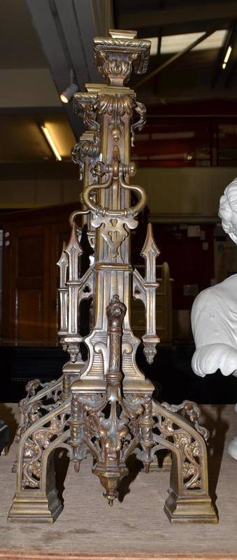 Lot 1645 - A pair of Gothic style fire dogs, 65cm high