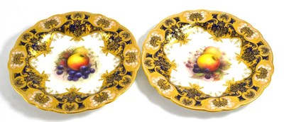 Lot 1 - A pair of Royal Worcester porcelain dessert plates, 1910, painted by Richard Sebright, 23cm...