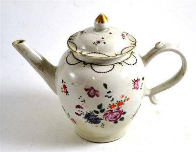 Lot 4 - An early 19th century famille rose teapot and cover, 17cm high