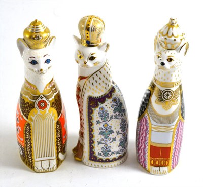 Lot 5 - Three Royal Crown Derby cats (lacking stoppers), 22cm high