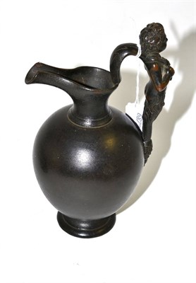 Lot 12 - Early 20th century jug with a fawn handle, 20cm high